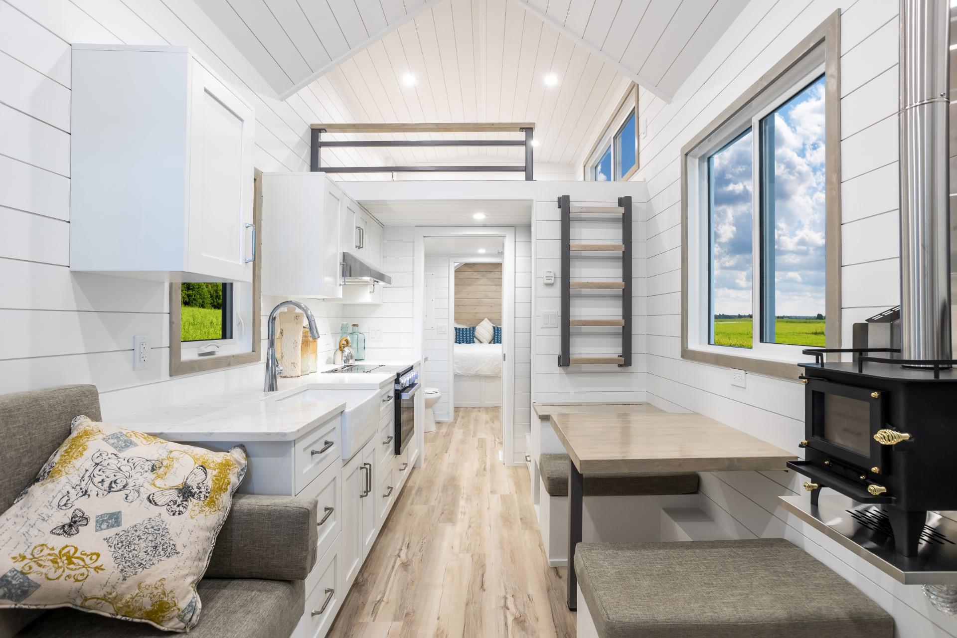 Kitchen with White Vaulted Ceiling - Cascade by Tree Hugger Tiny Homes