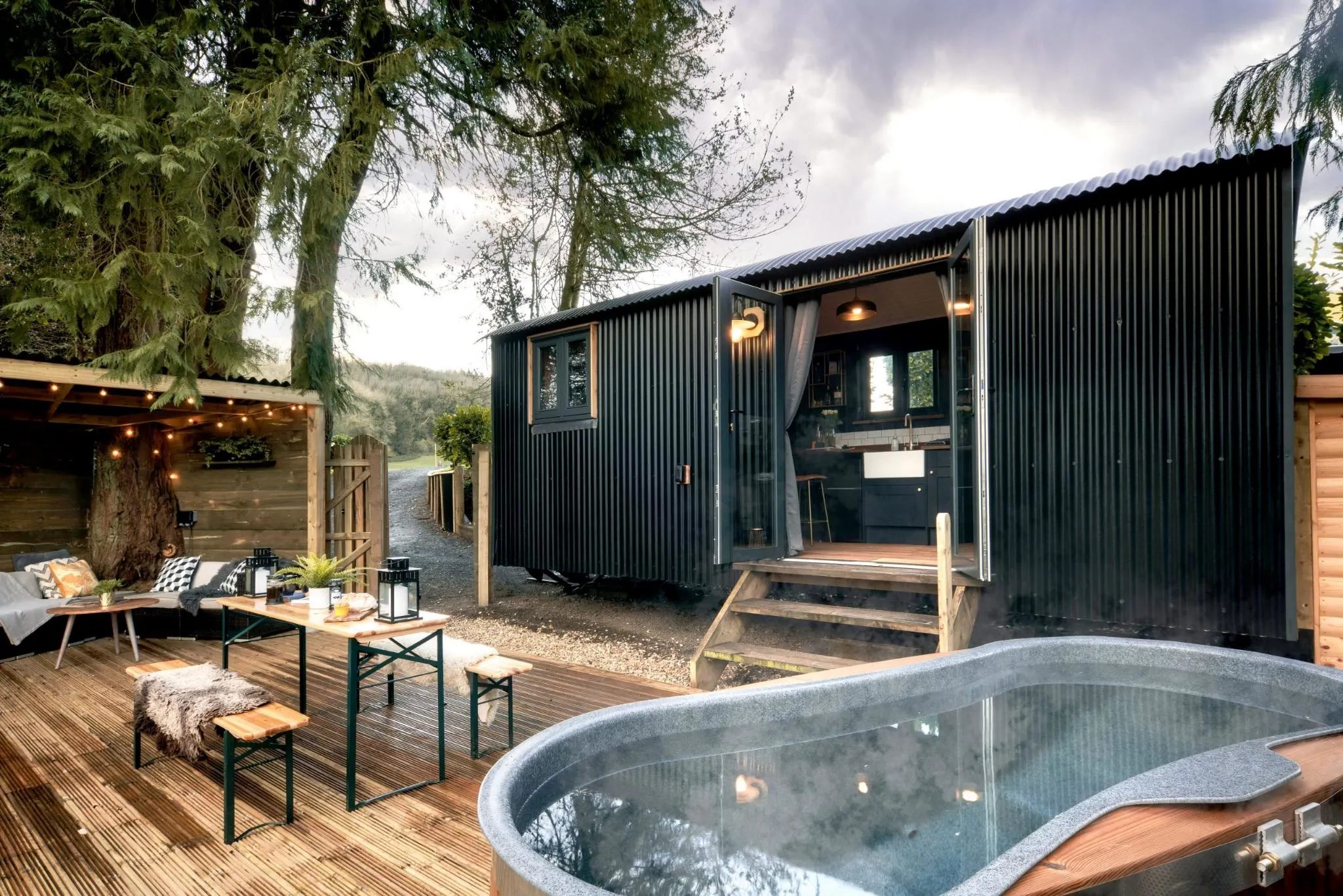 Tiny House with Hot Tub and Deck - Shepherds Parlour at The Shepherds Hut Retreat