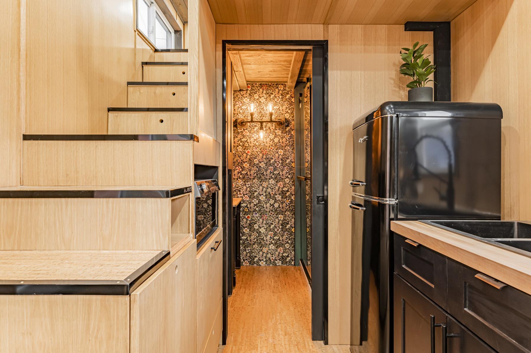 Stairs and Bathroom Entrance - Sherloak Homes by Acorn Tiny Homes