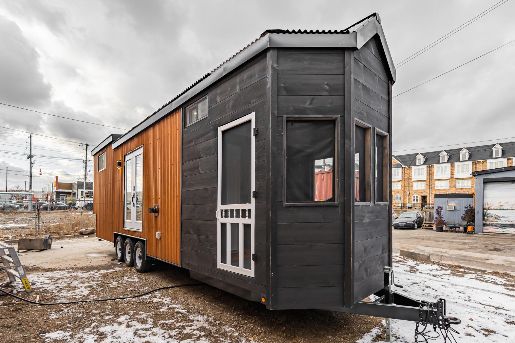 Exterior with Shou Sugi wood accents - Sherloak Homes by Acorn Tiny Homes