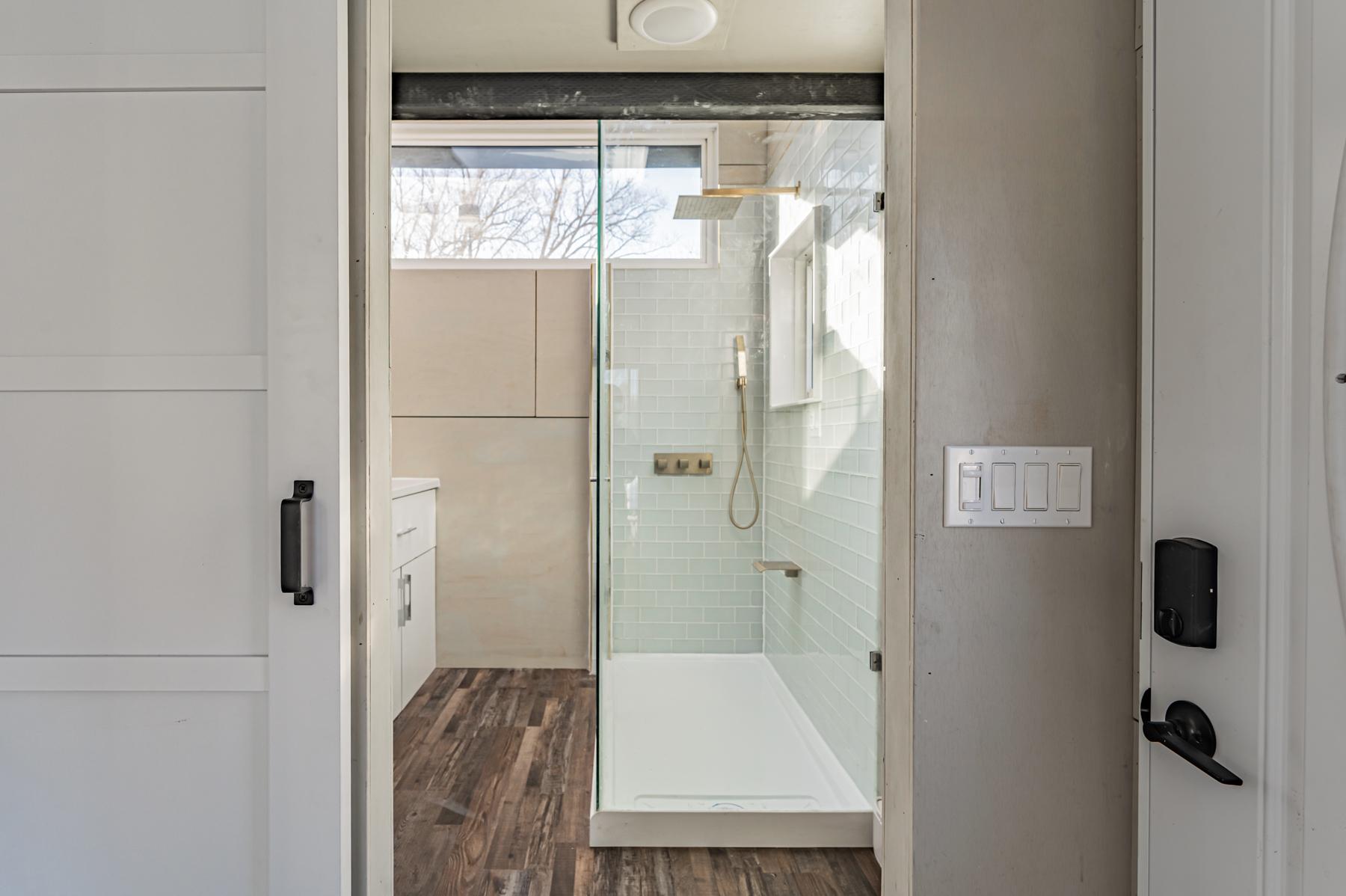 Bathroom with Corner Shower - Elevate by Acorn Tiny Homes