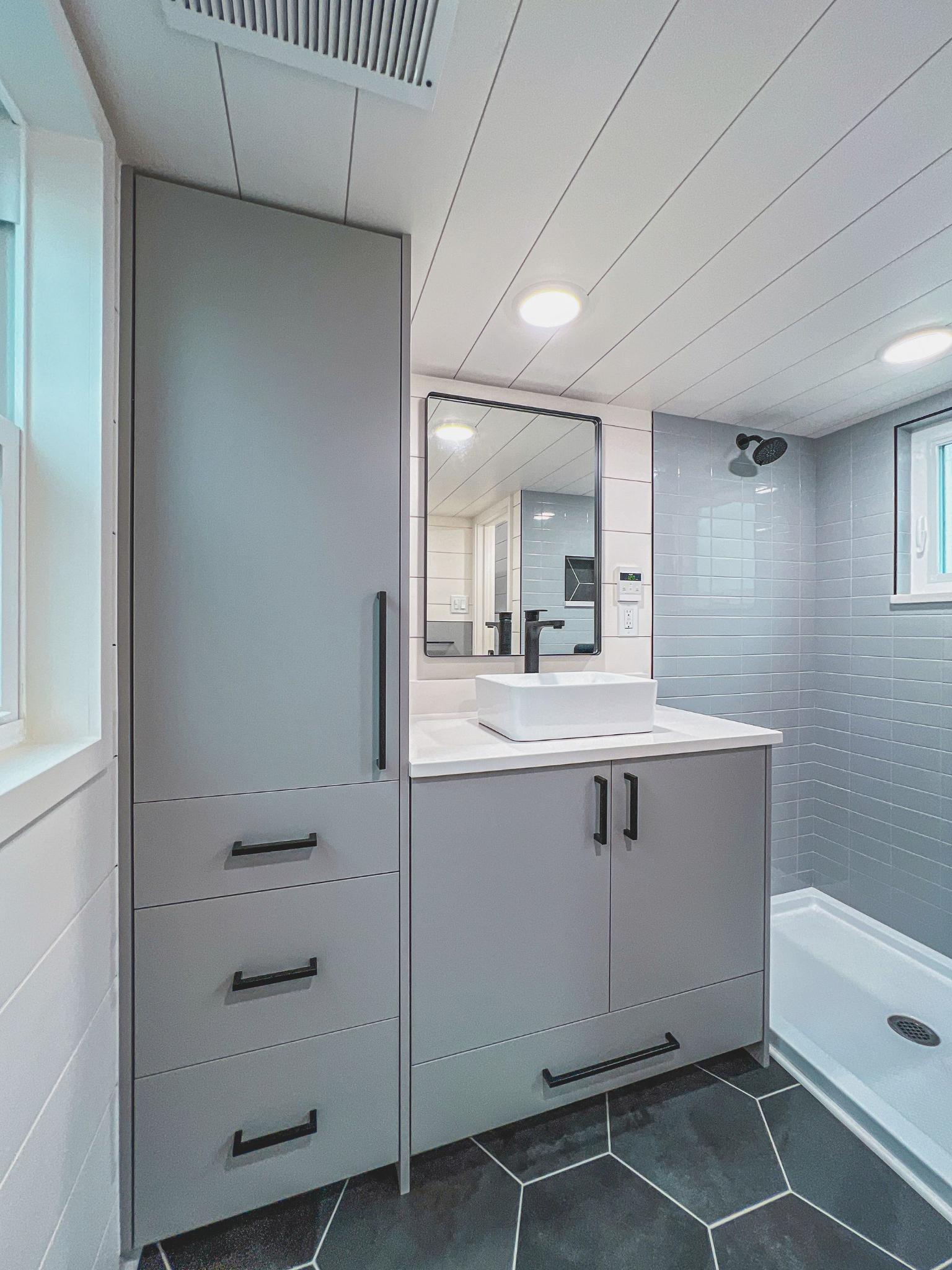 Bathroom with Large Closet and Drawers - Jock Tiny House by Movable Roots