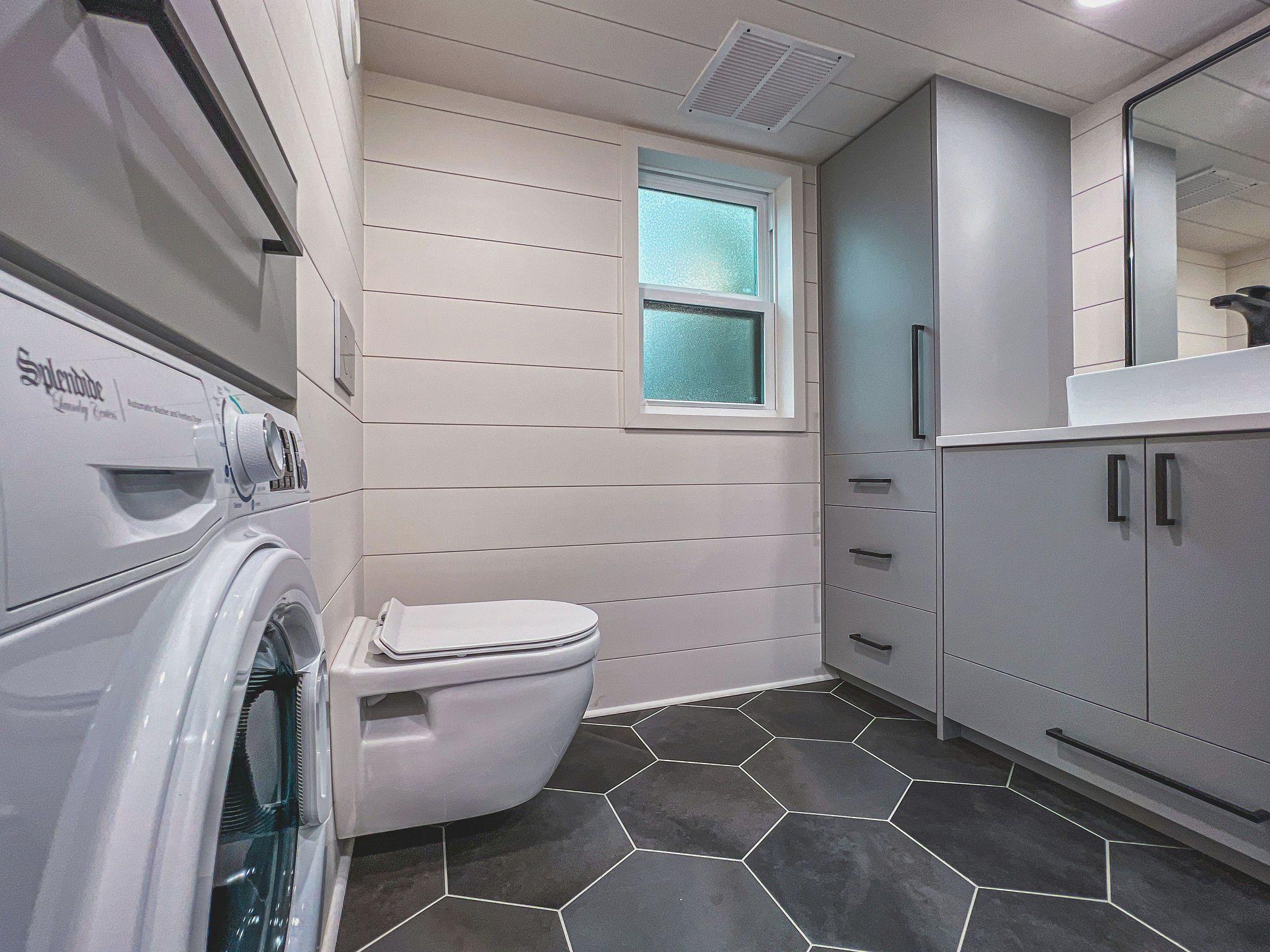 Large Bathroom with Washer/Dryer Combo - Jock Tiny House by Movable Roots