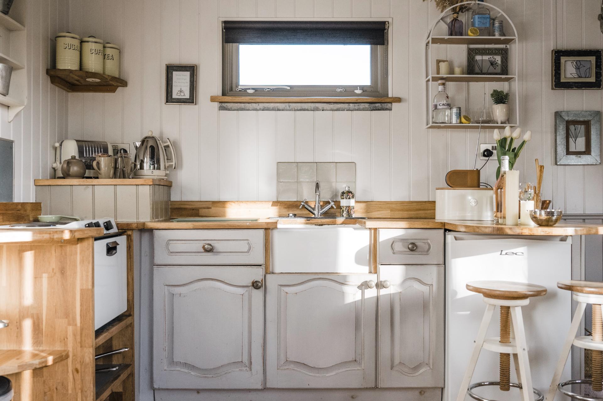 Kitchen with White Farmhouse Sink - Shepherds Keep at The Shepherds Hut Retreat