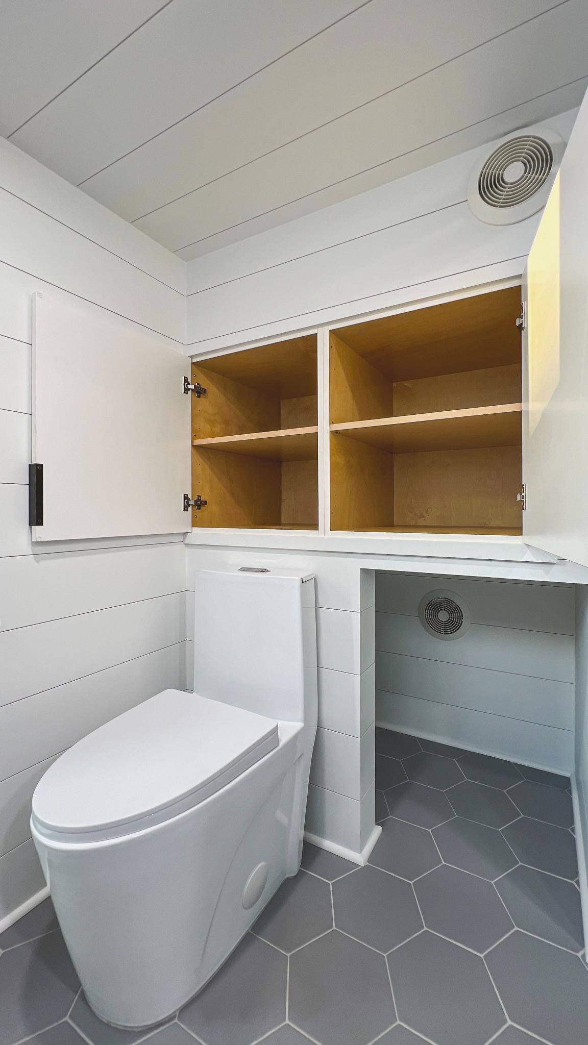 Bathroom Storage and Toilet - Kupersmit Tiny House by Movable Roots