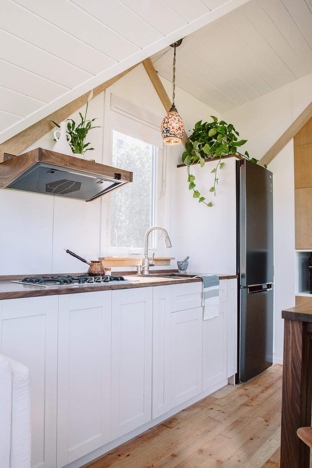 Kitchen with White Cabinets - Macdonald by Fritz Tiny Homes