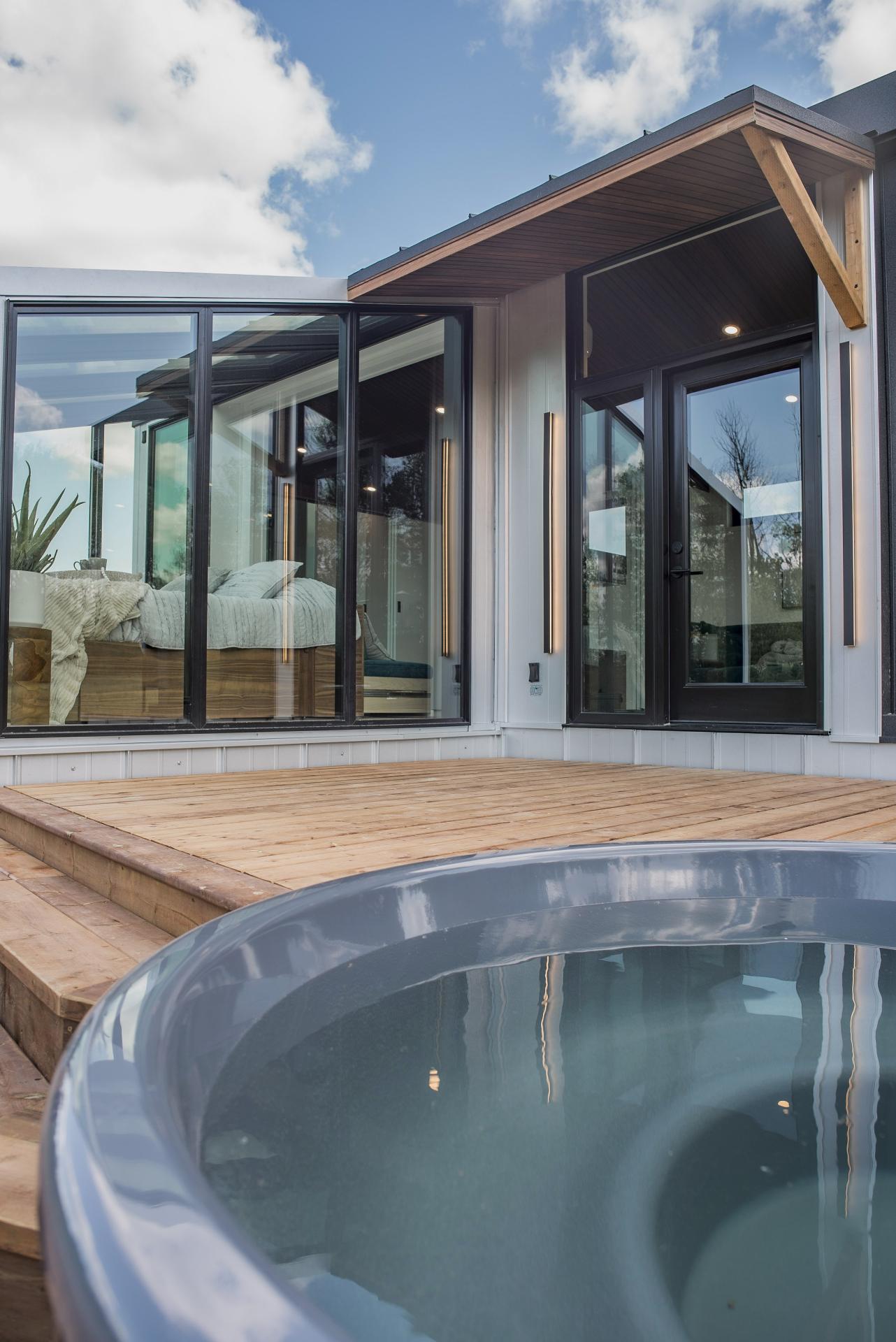 Jacuzzi and Deck - Refuge Bay Halcyon Stay by Fritz Tiny Homes