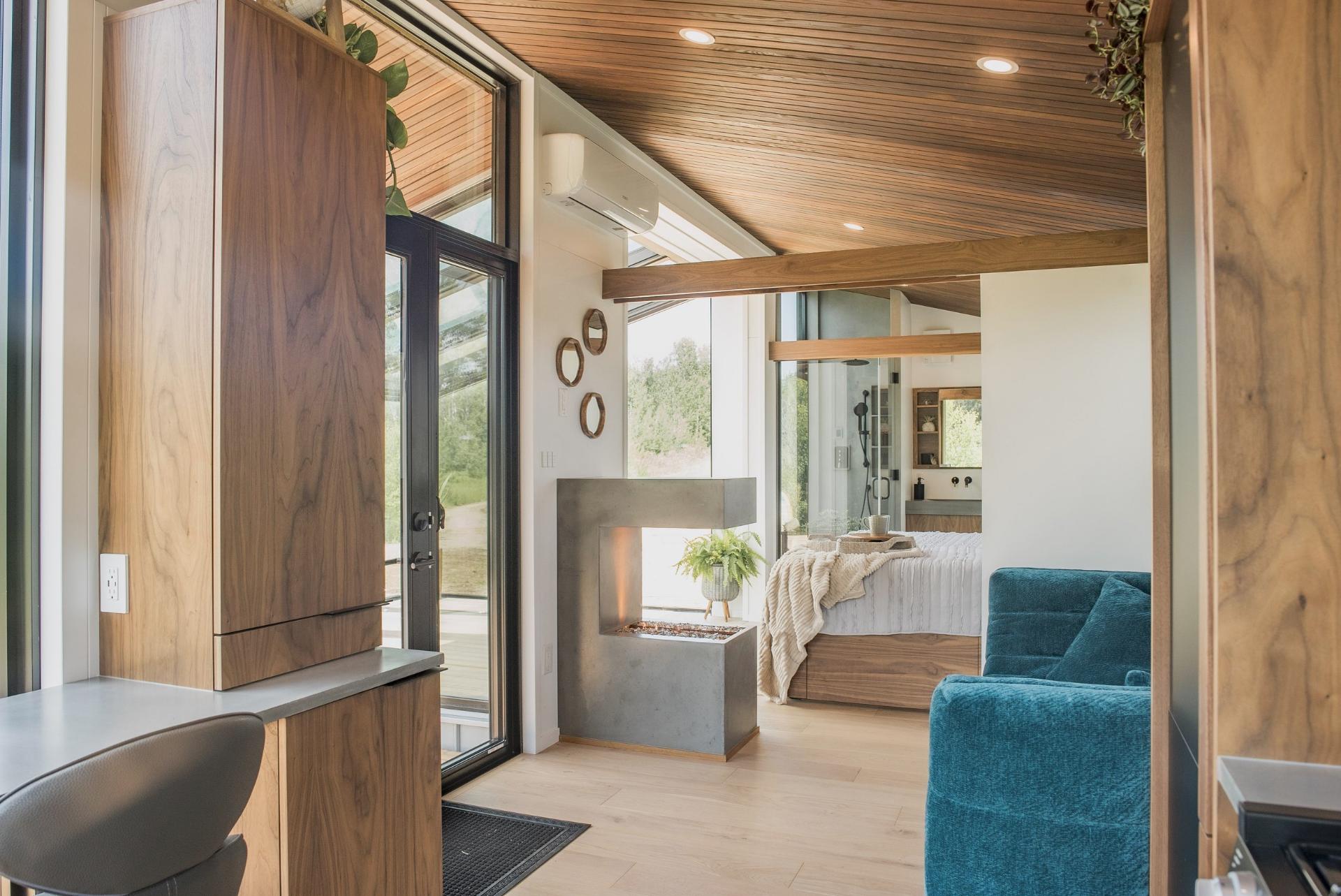 Living Room with Fireplace - Refuge Bay Halcyon Stay by Fritz Tiny Homes