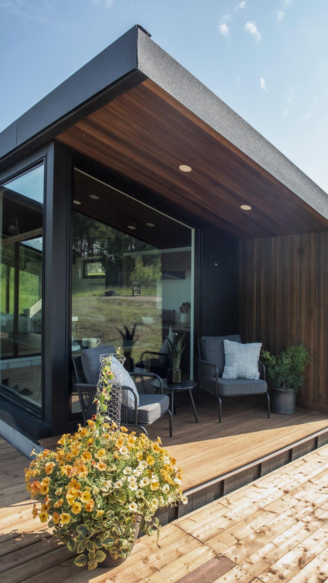 Covered Deck with Two Chairs - Refuge Bay Halcyon Stay by Fritz Tiny Homes