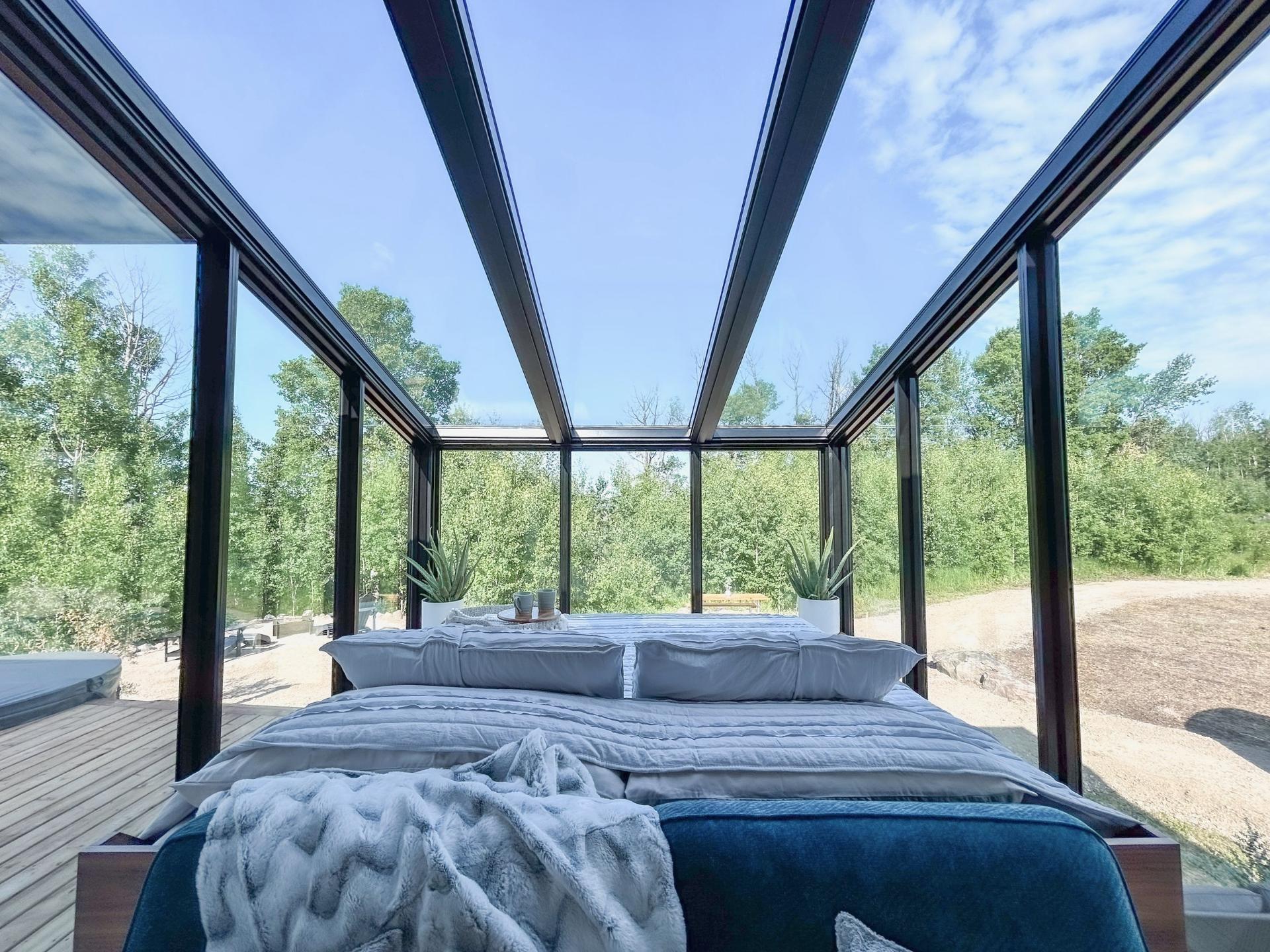 Bed Surrounded by Windows - Refuge Bay Halcyon Stay by Fritz Tiny Homes