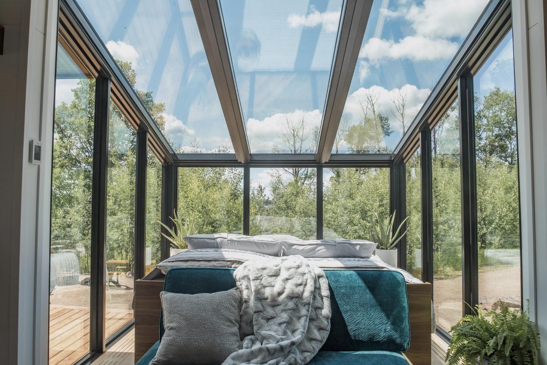 Bedroom with All Window Walls and Ceiling - Refuge Bay Halcyon Stay by Fritz Tiny Homes