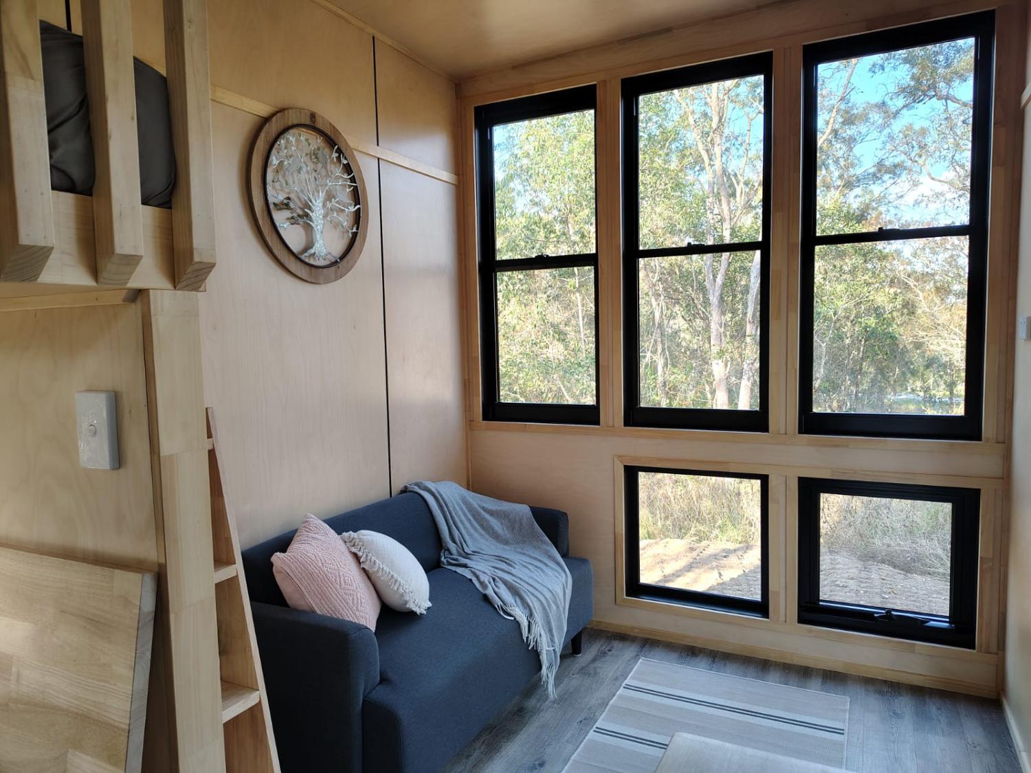 Living Room with Large Window Wall - Wildscape Terra by Tiny Tect